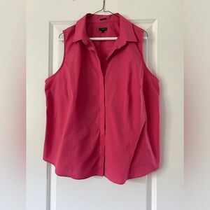 Deep coral sleeveless blouse.